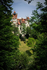 Mysterious beautiful Bran Castle. Vampire Residence of Dracula in the forests of Romania	