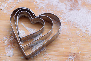 Pastry cutter on wooden board