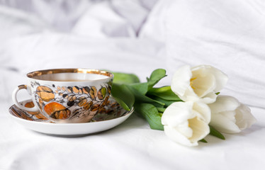 mug, 3 white tulips on a white sheet, flowers
