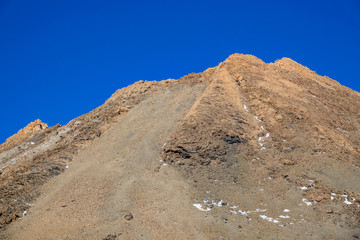 Fototapeta na wymiar Top of Teide crater against blue sky