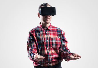 Guy in mask experiencing virtual reality as new entertainment device