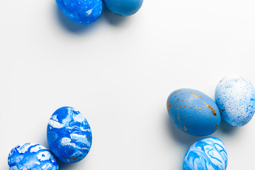blue Easter eggs isolated on white.