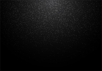 Abstract white glitter on black background. Snow falling