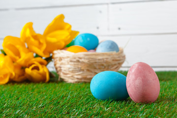Easter Eggs with flower on Green Grass