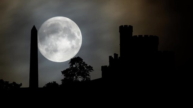 Calton Hill Hamilton's Obelisk and Governor's House by Night with Full Moon, Edinburgh, Scotland. It has been called a toy castle for its romantic design and fake battlements