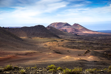 Amazing lunar landscape of Timanfaya National Park on the volcanic island of Lanzarote in Spain.