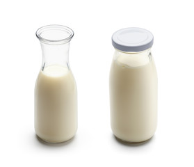 Milk in a jug and a bottle of milk