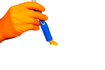 Washing concept. A male man hand with brush isolated on white background. Worker cleaning. Cleaning with cloth, foam and brush. Cleaning concept. Hand in orange protective rubber glove