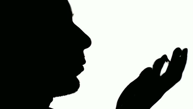 Men eating glass ball