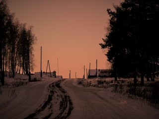 road in village in sunset light
