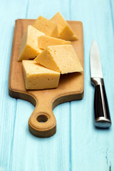 cheese on a cutting board
