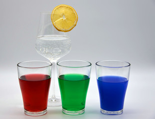 Glasses with colored water. RGB red blue green