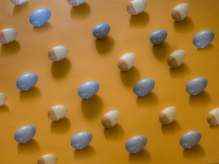 Easter eggs pattern on yellow background