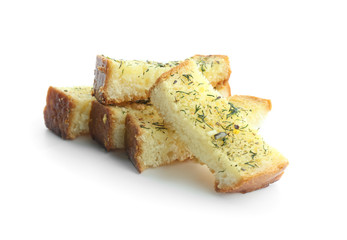 Tasty cut garlic bread on white background