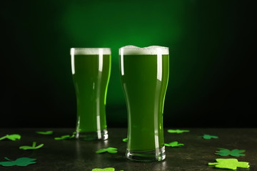 Glasses of green beer on table. Saint Patrick's Day celebration