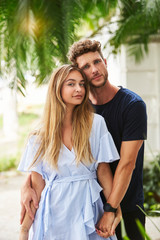 Fototapeta premium Beautiful young couple looking to camera
