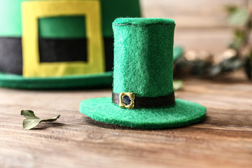 Leprechaun hat on wooden table. St. Patrick's Day celebration