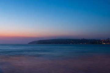 Fototapeta na wymiar Foggy dawn view at the beach.