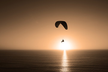 Paragliding By The Sun