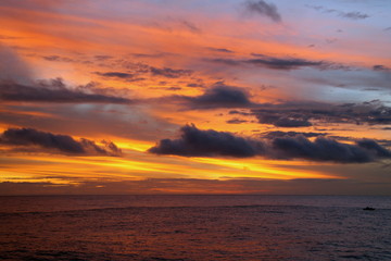 Naklejka na ściany i meble sunrise with clouds on the ocean