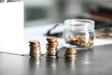 Stacked coins on table. Concept of planning budget