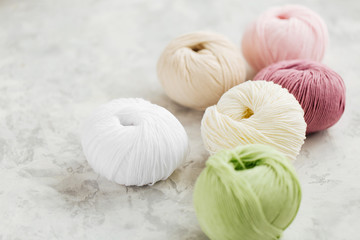 Yarn for knitting in pastel colors.