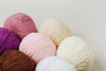 Colorful yarn for knitting on White background.