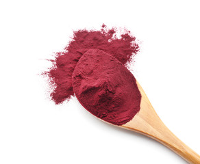 Spoon with acai powder on white background