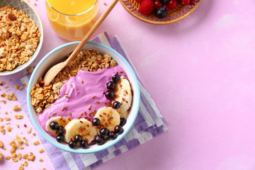 Composition with tasty acai smoothie on color background