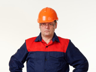 man in builder overalls on white background.