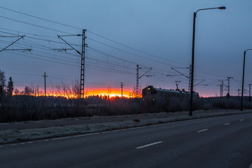Morning train at beautiful sunrise in Finland