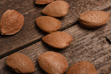 alamond on wood background
