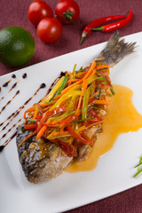 Steamed dorado fish