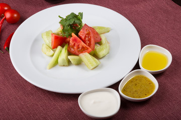 Mixed raw cucumber and tomato salad