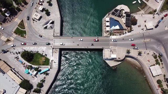 Aerial drone video of new famous public strait cable bridge of Halkida or Chalkida connecting mainland with Evoia island, Greece