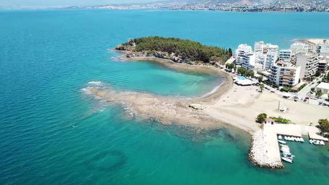 Aerial drone video of famous lighthouse built in small island and town of Halkida, Evoia island, Greece