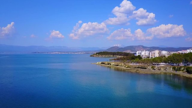 Aerial drone video of famous lighthouse built in small island and town of Halkida, Evoia island, Greece