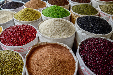 Bags of rice, beans and seeds on vietnameese market