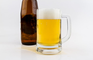 Mug with beer on white background