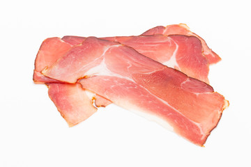 Hamon sliced on white background. Spanisch traditional meat.