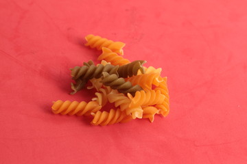 raw spiral dough in colorful background