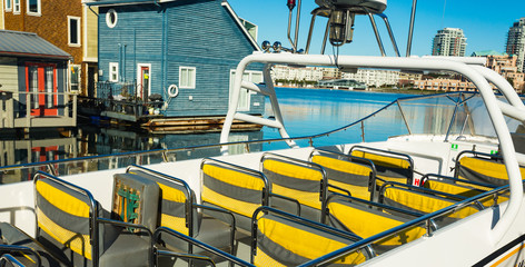 Collorful village of floathomes on bright sunny day, blue sky.