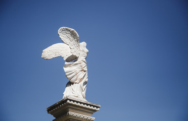 Statue of Winged Victory of Samothrace (called Nike of Samothrace) in the Park Aivazovsky in Crimea - obrazy, fototapety, plakaty