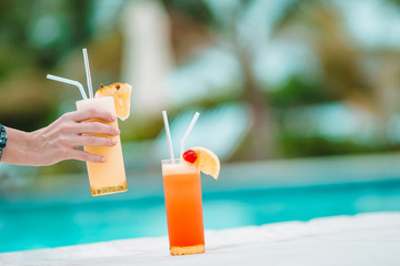 Two tasty cocktails on tropical white beach