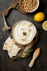 Homemade hummus with thyme, olive oil. Middle Eastern traditional and authentic arab cuisine. Top...