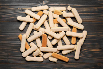 Italian Savoiardi ladyfingers Biscuits on wooden backgound