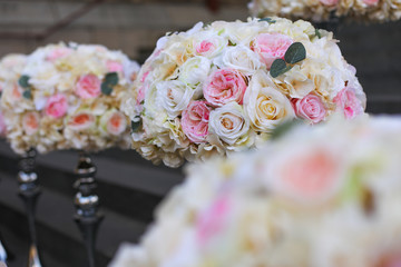 Beautiful roses bouquets on recipients