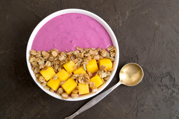 Homemade healthy berry yogurt. on dark background.