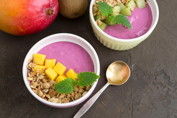 Homemade healthy berry yogurt. on dark background.