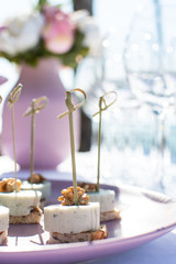 canape with cheese on toast and walnuts